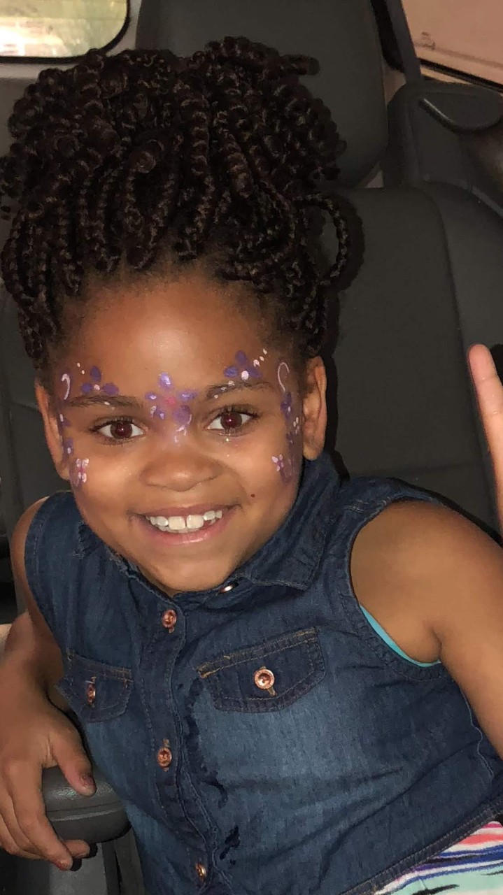 Journey posing for the camera with face paint